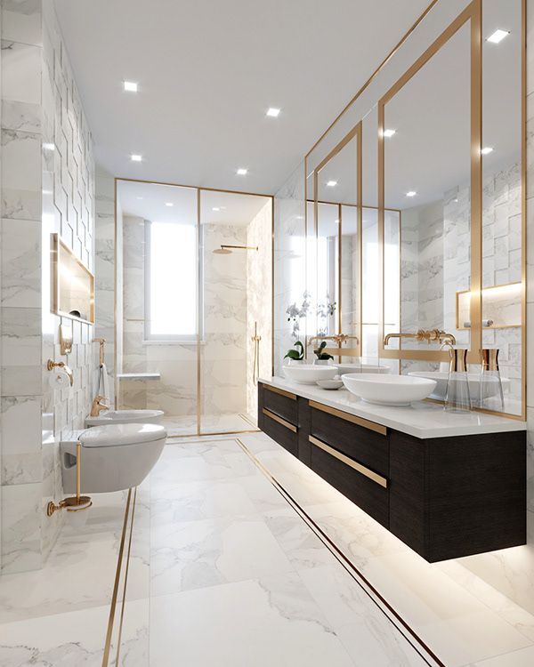 a large bathroom with marble walls and flooring