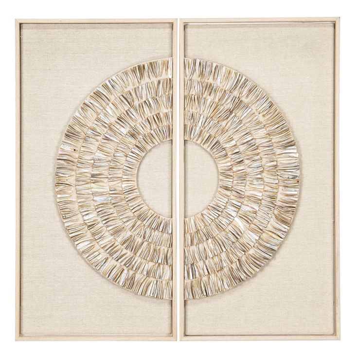 two framed artwork pieces with white and beige designs