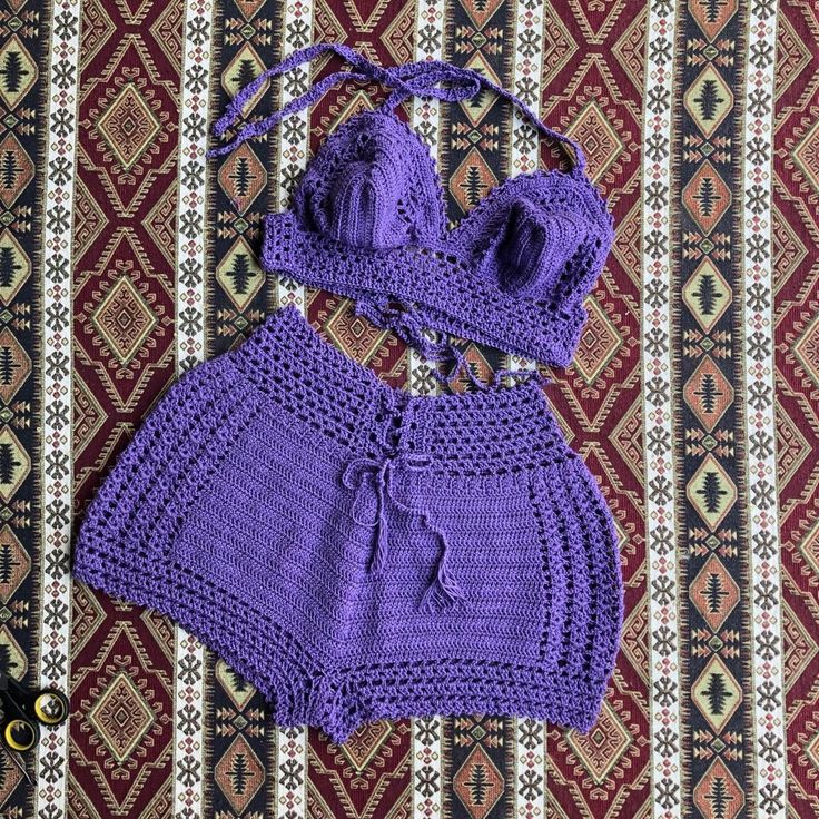 Crochet shorts set Boho festival bralette and shorts two piece crochet outfit woman Beach cover up pants with matching crop top rave outfit Material: cotton, microfiber Size: choose in variations! Colour: choose in variations! This cute crochet outfit included crop top and shorts. It's perfect for festival beach wear! Size chart women XS: Chest: 32.3"/ 82 cm Waist: 24.4"/ 62 cm Hips: 35.4"/ 90 cm S: Chest: 33.9"/ 86 cm Waist: 26"/ 66 cm Hips: 37"/ 94 cm M: Chest: 35.4"/ 90 cm Waist: 27.5"/ 70 cm Hips: 38.6"/ 98 cm L: Chest: 37.8"/ 96 cm Waist: 30"/ 76 cm Hips: 41"/ 104 cm XL: Chest: 40.15"/ 102 cm Waist: 32.3"/ 82 cm Hips: 43.3"/ 110 cm For more crochet outfits for women's, click here: https://www.etsy.com/shop/Garust?ref=seller-platform-mcnav&section_id=35266619 Garust Two Piece Crochet Outfit, Crochet Shorts Set, Two Piece Crochet, Beach Cover Up Pants, Beach Festival Outfit, Cover Up Pants, Crochet Outfits, Crochet Outfit, Crochet Bralette