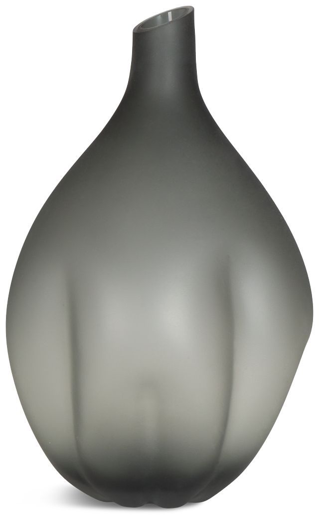 a large gray vase sitting on top of a white table