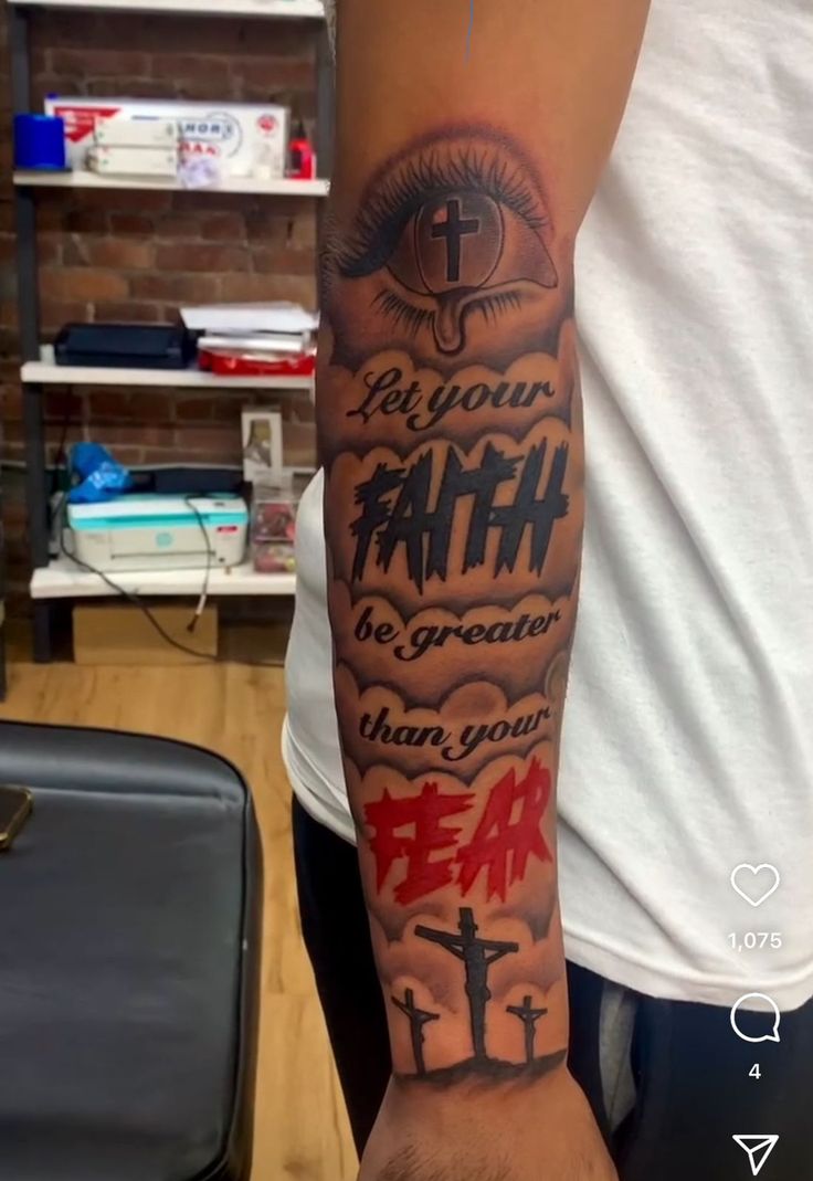 a man with a tattoo on his arm that says, follow faith be greater than your fear