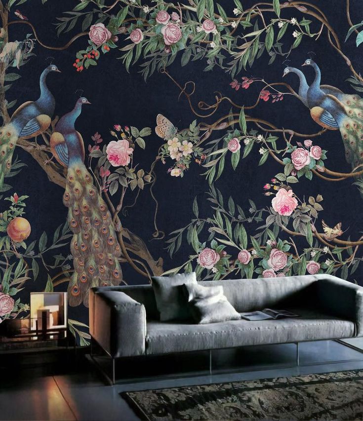 peacocks and flowers on a dark blue wallpaper mural in an elegant ...