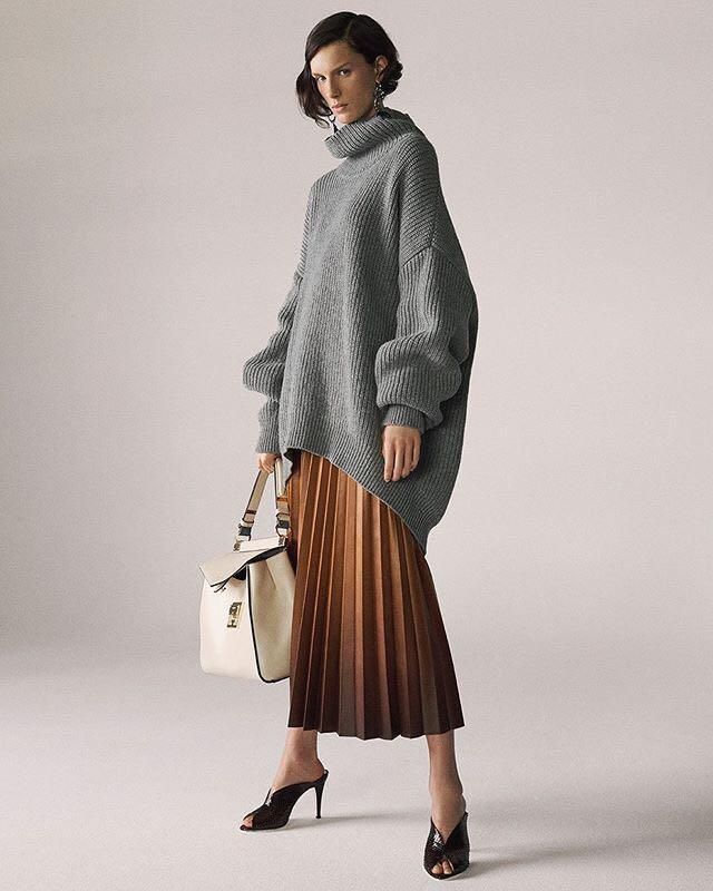 The new season's collections are testament to leather's versatility. See @givenchyofficial's pleated skirt for a ladylike take. Hit the link in bio to shop. #newseason #officelook from @MATCHESFASHION.COM's closet #givenchy Brown Pleated Skirt, Mode Tips, Joe Montana, Chique Outfits, Gray Sweater, Work Outfits Women, 가을 패션, Fashion Show Collection, Fashion Mode