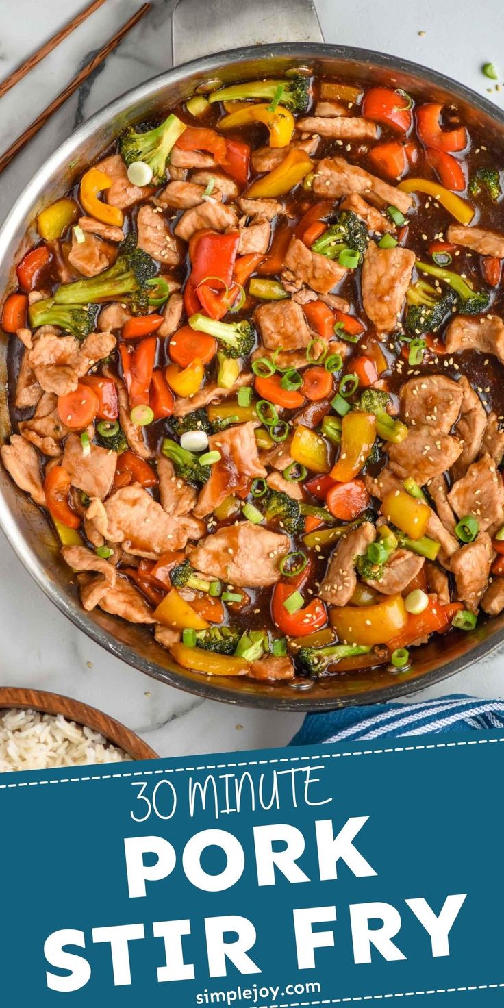 pork stir fry in a skillet with the title overlay that reads 30 minute pork stir fry