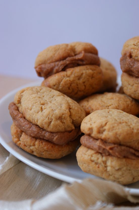 a white plate topped with cookies on top of a table