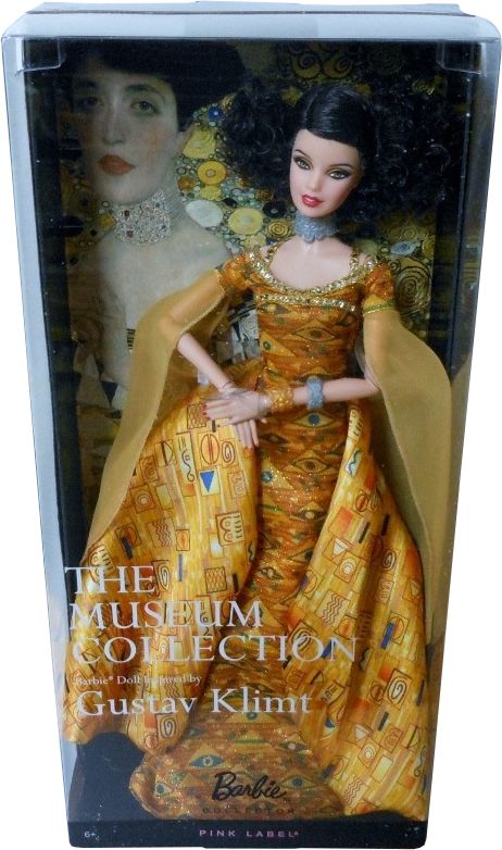 the doll is wearing an orange dress