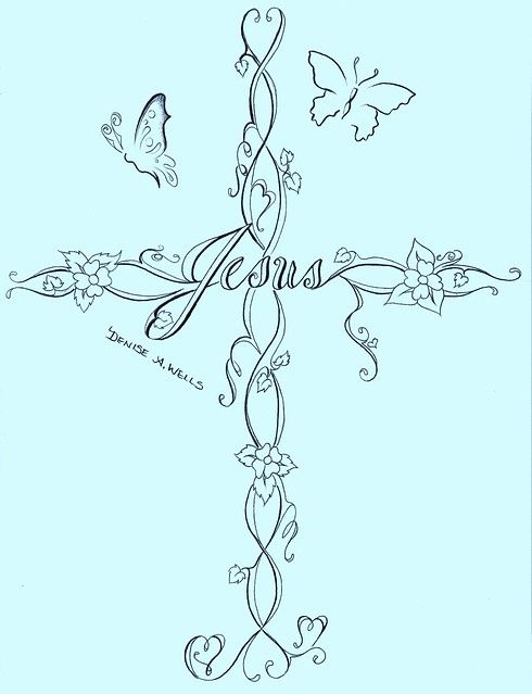 a cross with flowers and butterflies on it, as well as the word jesus written in cursive writing