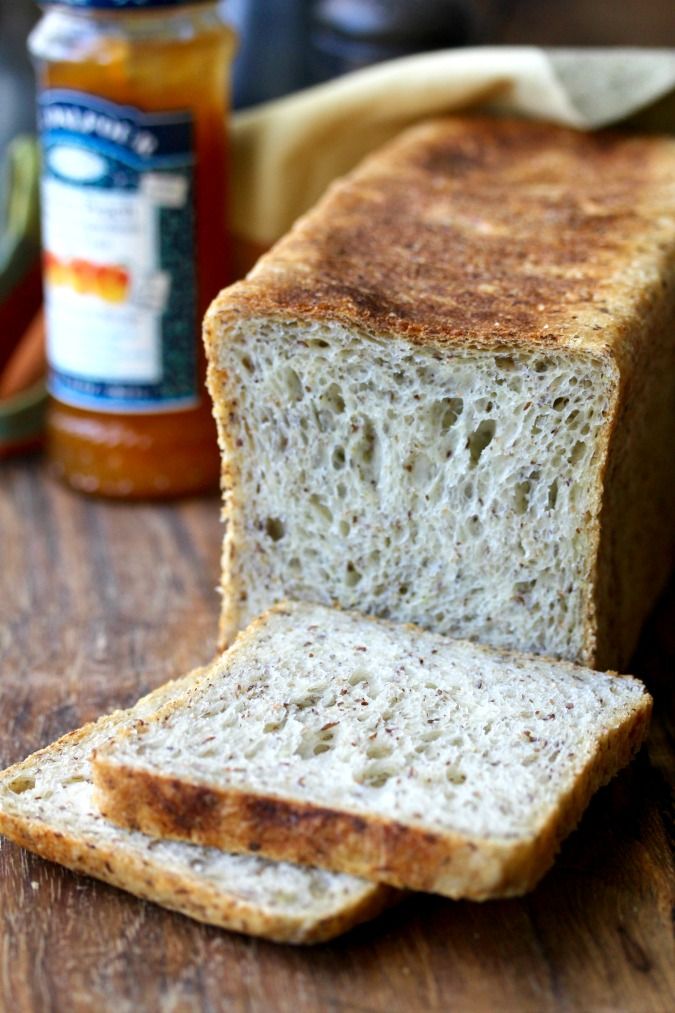 a loaf of bread sitting on top of a wooden table