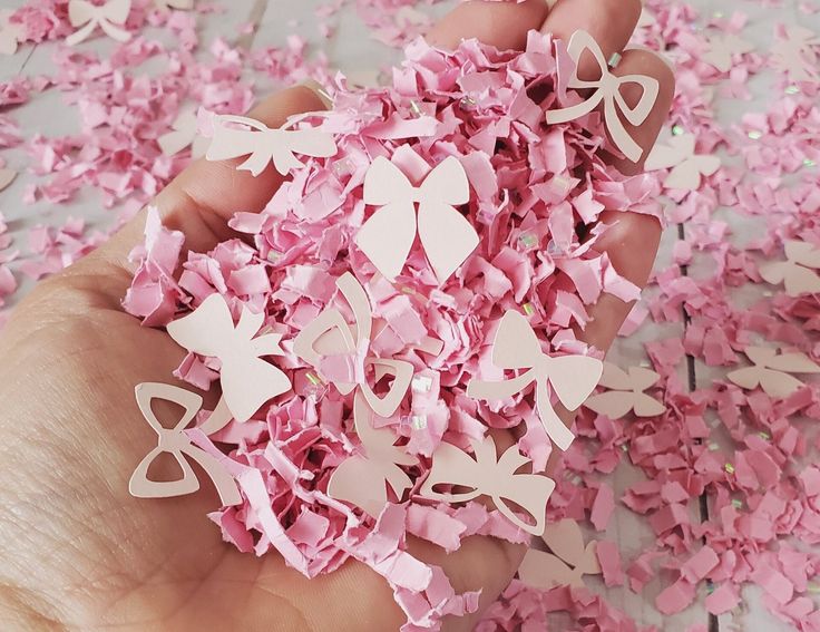 This pink bow  confetti is perfect to complete your coquette party decor, girly first birthday, pink bow baby shower, She's tying the knot party, or coquette theme bachelorette party, with holographic confetti that make a perfect match with the light pink bows cut outs.  You will receive 1 oz (1cup) of confetti that includes 75 light pink bows (15 of each one), pink shredered cardstock, and holographic confetti. Bows Cut Outs Size: between 0.75 and 1 inch. You can match your pink bow confetti wi Girly Grad Party Ideas, Love Shack Fancy Baby Shower Theme, Pink Bow Baby Shower Theme, Confetti Table Decor, Kylie Baby Shower, Coquette Theme, Fancy Baby Shower, Theme Bachelorette Party, Coquette Party