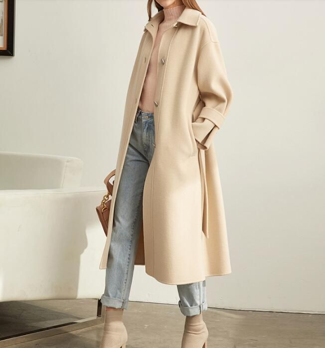 Product Description: This is a handmade cashmere coat high grade fabric,cashmere fabric.also could be custom made with any size and other colors,please feel free to contact with me if you want custom it. Material: wool 80%- 90% Size: S: Bust : 110 cm shoulder:51cm Sleeve:50cm Length:107 cm M: Bust : 114 cm shoulder:52cm Sleeve: 51 cm Length: 107 cm L: Bust : 118 cm shoulder:53cm Sleeve:52 cm Length:107 cm XL: Bust :122 cm shoulder:54cm Sleeve:53 cm Length:107 cm Beige Long Sleeve Wool Coat For Winter, Winter Long Sleeve Single Breasted Sweater Coat, Single Breasted Long Sleeve Sweater Coat For Winter, Long Sleeve Beige Wool Coat For Fall, Solid Wool Sweater Coat For Spring, Spring Wool Sweater Coat, Spring Solid Wool Sweater Coat, Long Sleeve Fall Outerwear For Business, Office Outerwear With Stand Collar And Hidden Buttons