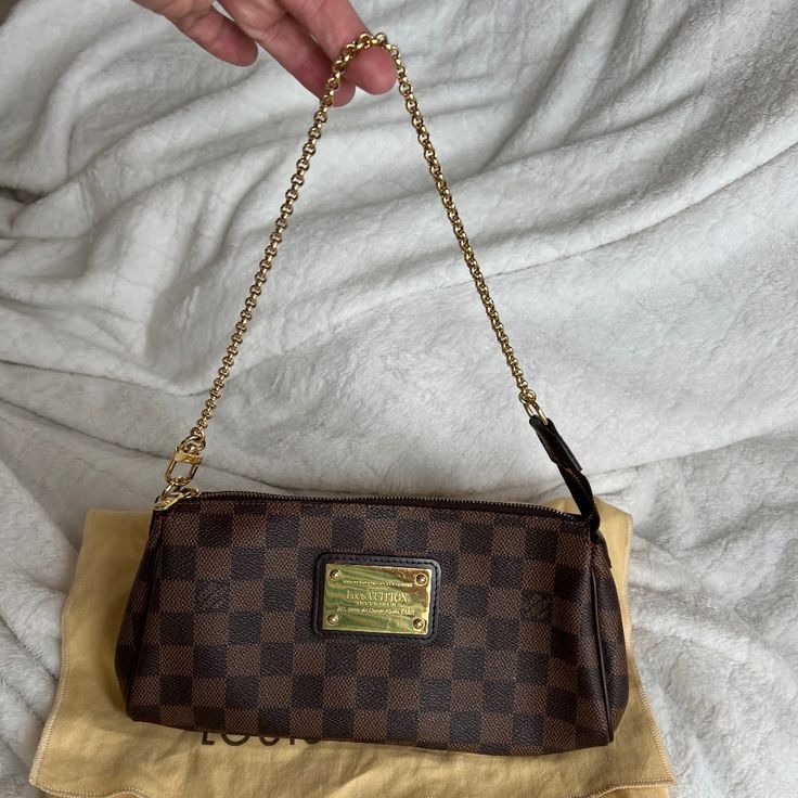 Authentic Louis Vuitton Eva Damier Amazing Condition. Barely Used, Straps And Corners Are In Excellent Condition. Comes With Dust Bag And Box. (Full Inclusion) Can Be Worn Crossbody, On The Shoulder Or As A Clutch. Super Versatile. This Bag Style Was Discontinued In 2010 And Has Been Since Sought After By Vintage Bag Lovers. Louis Vuitton Eva, Vintage Bag, Bag Style, Vuitton Bag, Louis Vuitton Bags, Vintage Bags, Authentic Louis Vuitton, Louis Vuitton Bag, Fashion Bags