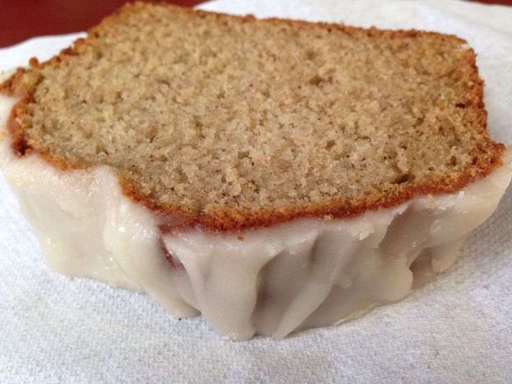 a piece of bread sitting on top of a white napkin