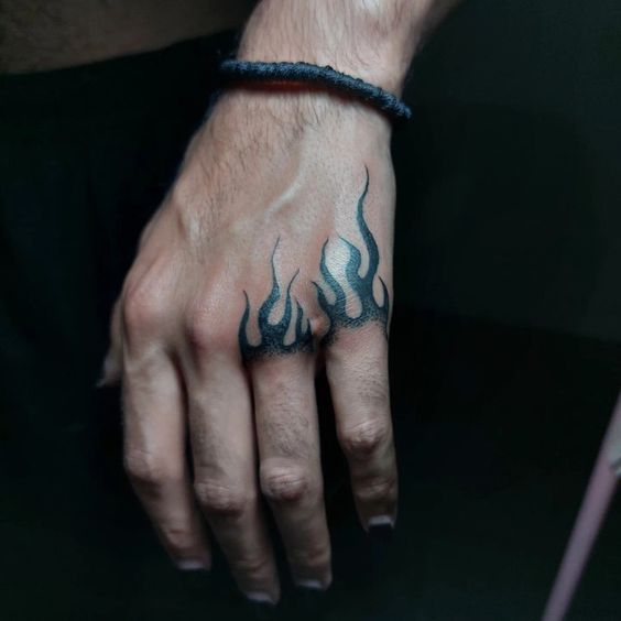 Tattoo Ideas For Men Hand Tattoos Fire, Flame Knuckle Tattoo, Creative Hand Tattoos For Men, Missing Finger Tattoo, Tiny Hand Tattoos Men, Flame Hand Tattoo Men, Men Knuckle Tattoos, Cool Easy Hand Tattoos, Easy Hand Tattoos For Guys