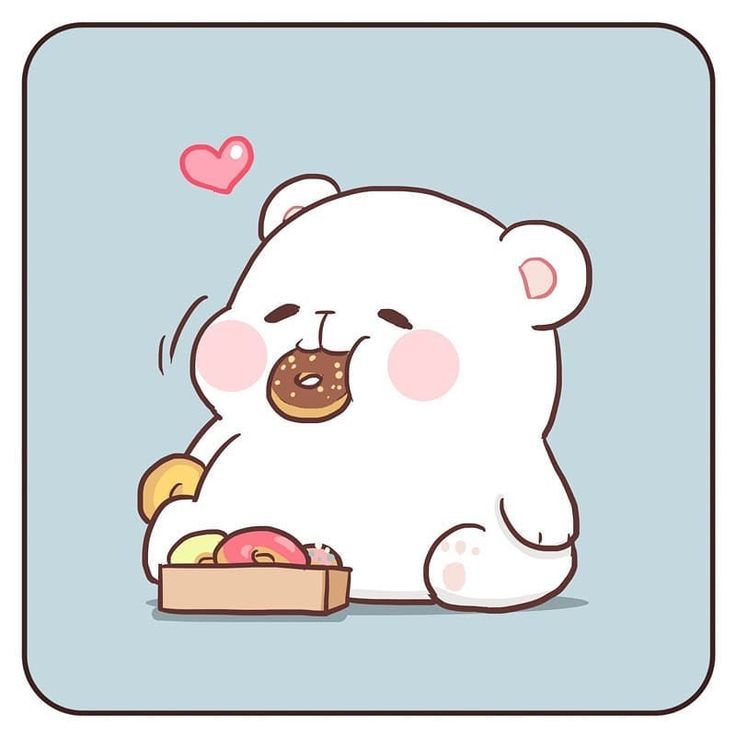 a white teddy bear sitting in front of a box filled with food