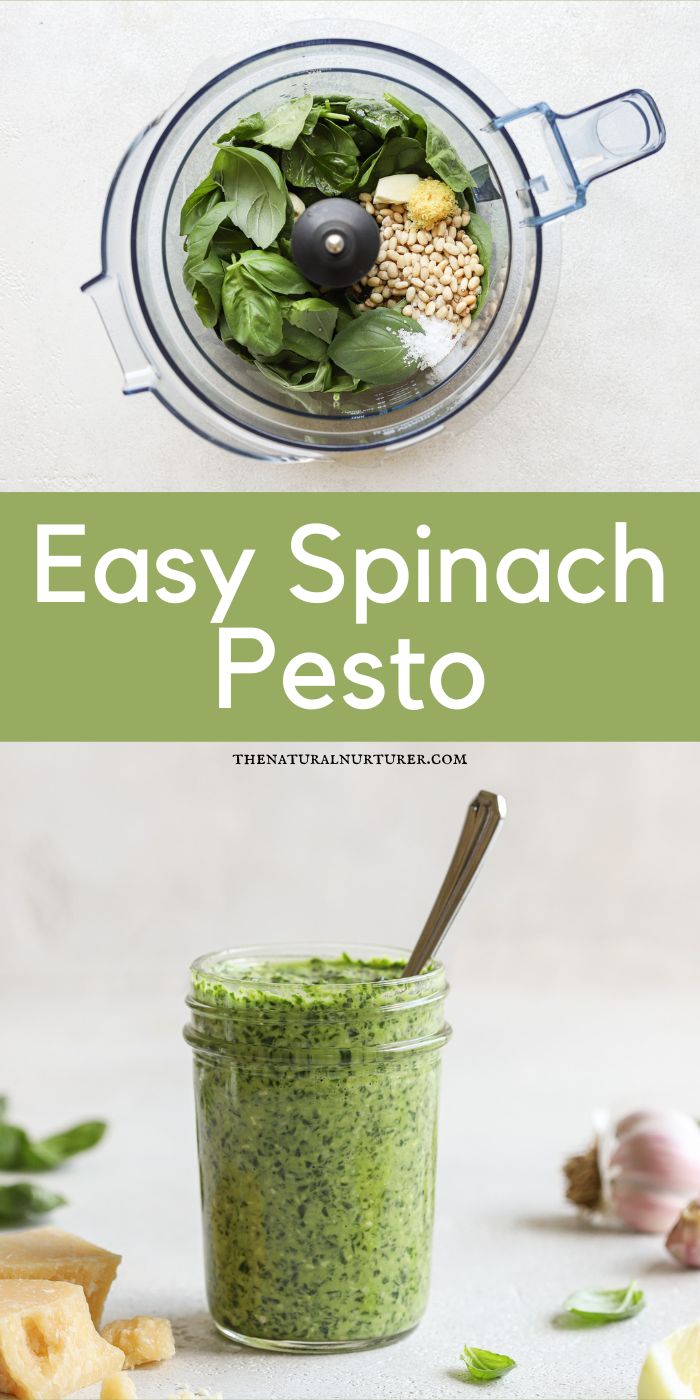 spinach pesto in a glass jar with basil leaves and garlic on the side