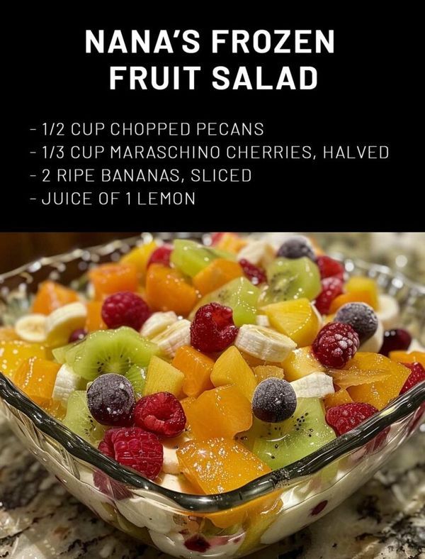 a glass bowl filled with fruit salad on top of a counter