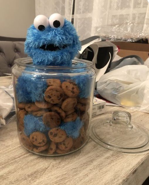 cookie cookies in a glass jar with eyes on top