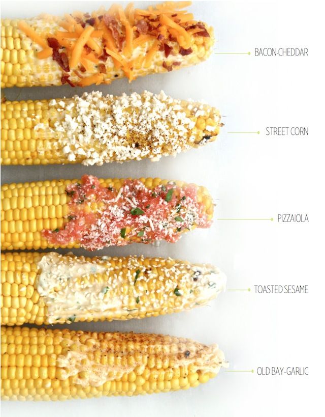 corn on the cob with seasoning and sprinkles arranged in rows