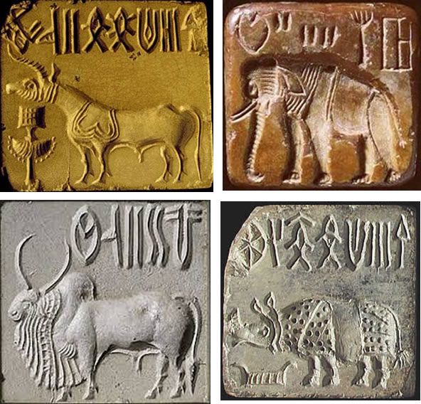 four different types of stone carvings with animals on them