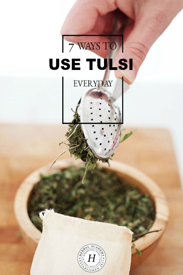 someone grating herbs in a wooden bowl with the words 7 ways to use tulsi everyday