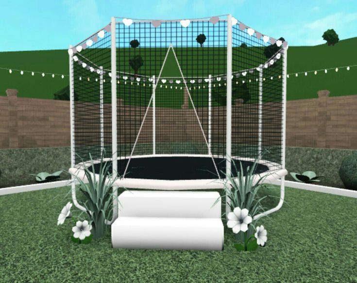 a 3d rendering of a trampoline in the middle of a field with flowers