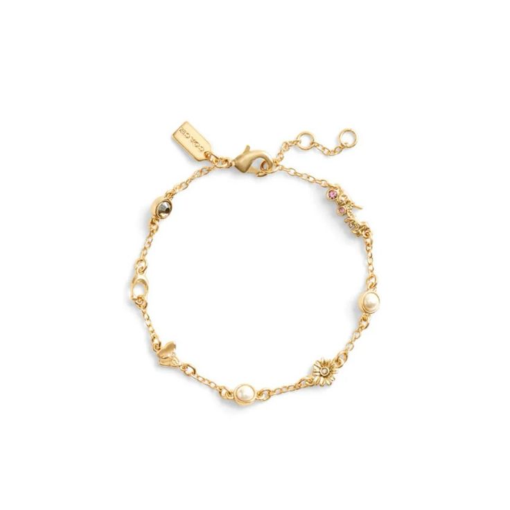 Refined Chain Strand Bracelet Featuring Playful Mixed Charms Including Signature Sculpted C And Iconic Horse And Carriage Motifs, Daisy, Butterfly And Pearls. Adorned With Minimal Stones. Bracelet Has An Adjustable Lobster Clasp Closure. Made From Brass, Glass Crystal And Glass Pearl. Gold-Plated Brass / Glass Lobster Claw Clasp 7''L Plus A 1'' Extender Horse Charm Bracelet, Daisy Butterfly, Horse And Carriage, Coach Jewelry, Brass Glass, Strand Bracelet, Glass Crystal, Jewelry Pouch, Womens Jewelry Bracelets