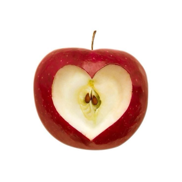 an apple with a heart cut in half