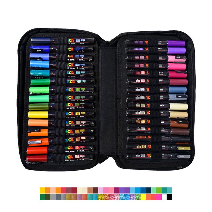 an open case filled with lots of different colored crayons