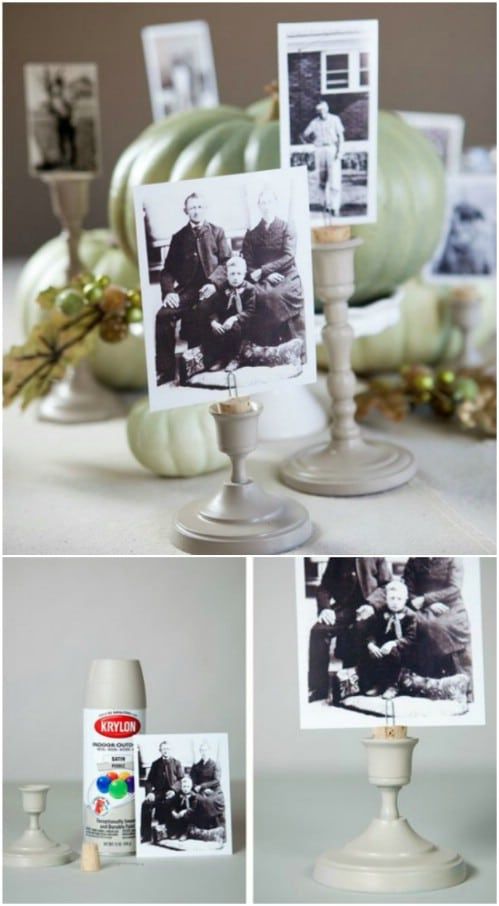 an assortment of pictures and candles are displayed on a table with pumpkins in the background