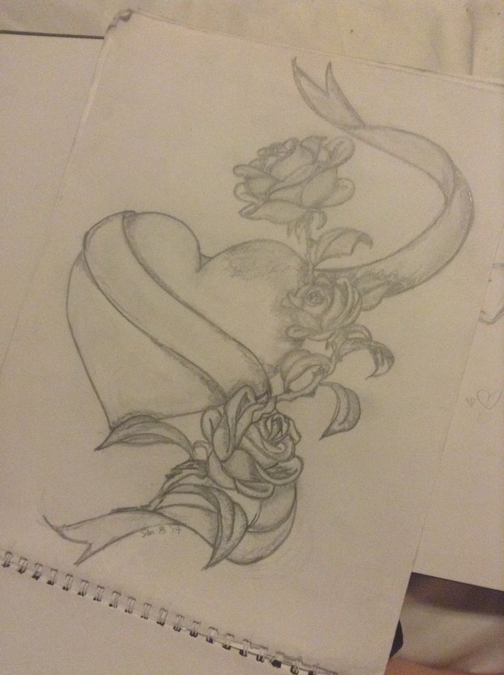 a drawing of a heart with roses on it