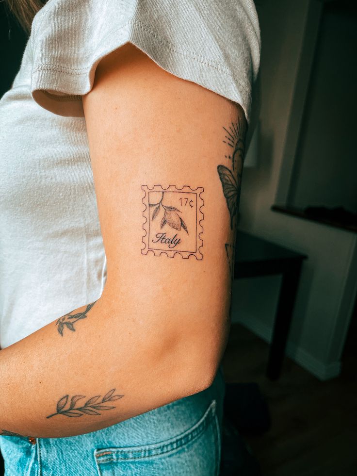 a woman with a small tattoo on her arm