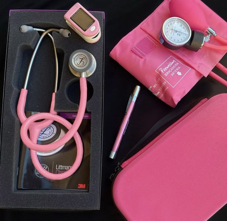 an assortment of medical supplies including a stethoscope, wallet, and pen