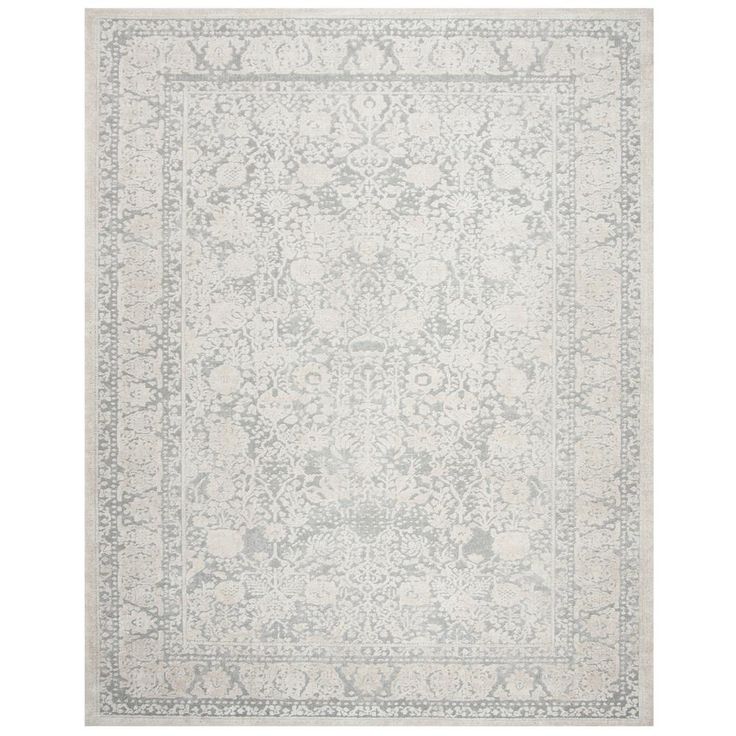 a white rug with an intricate design on the top and bottom, in grey tones