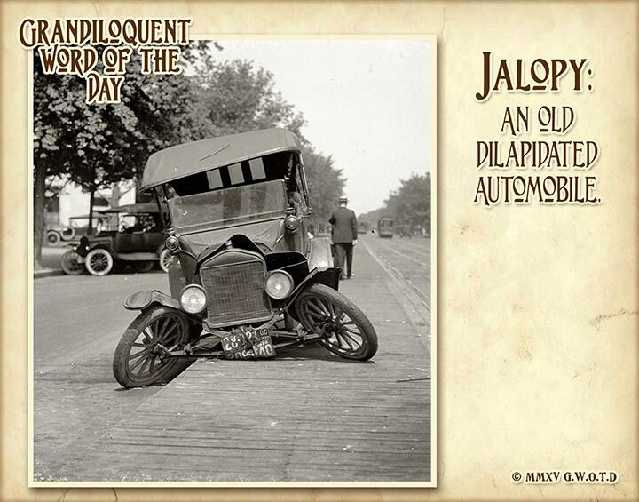 an old photo with the caption jalopy, an old plated automobile