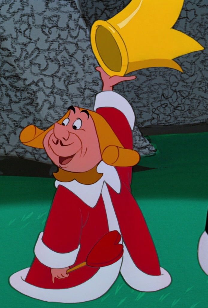 a cartoon character with a bell on his head holding up a cup in the air