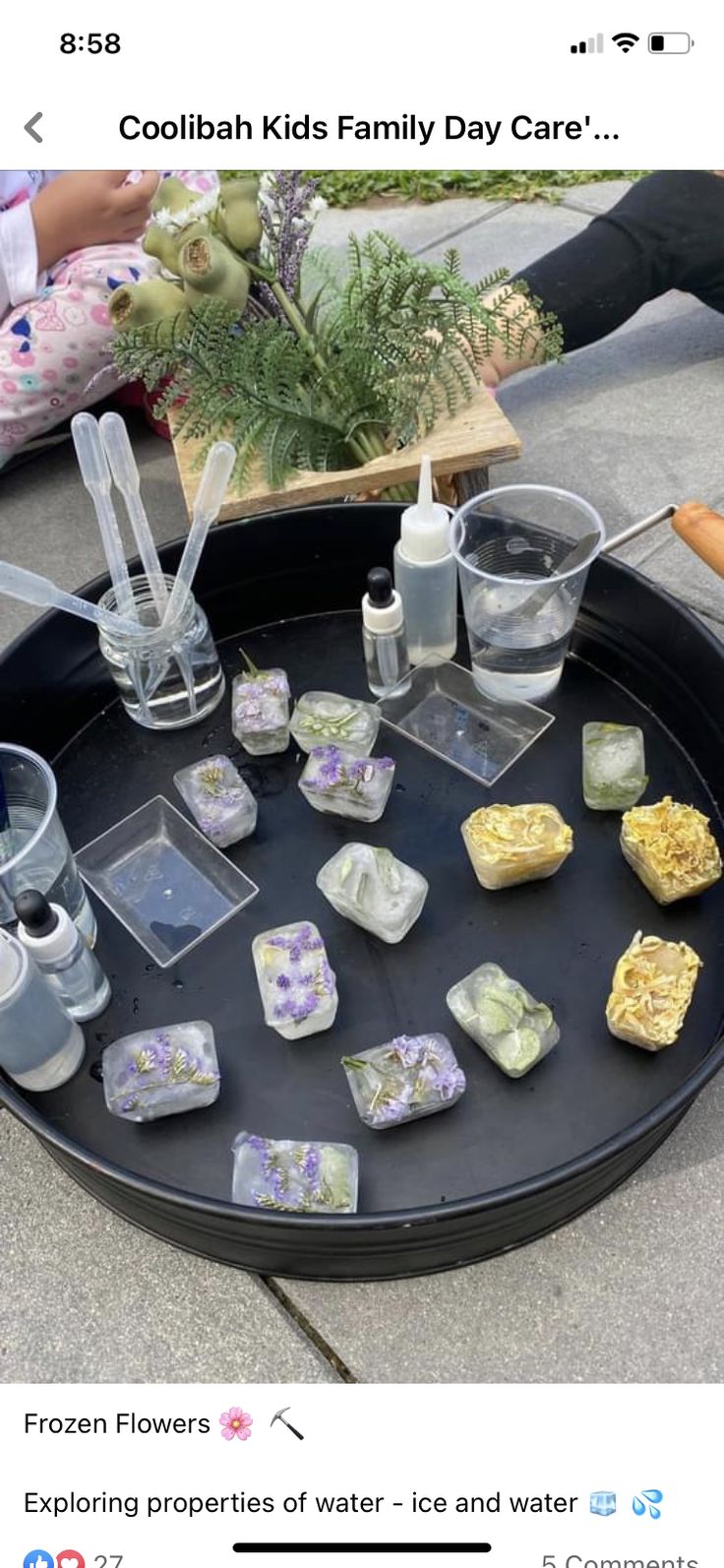 a tray with some ice cubes sitting on top of it next to other items