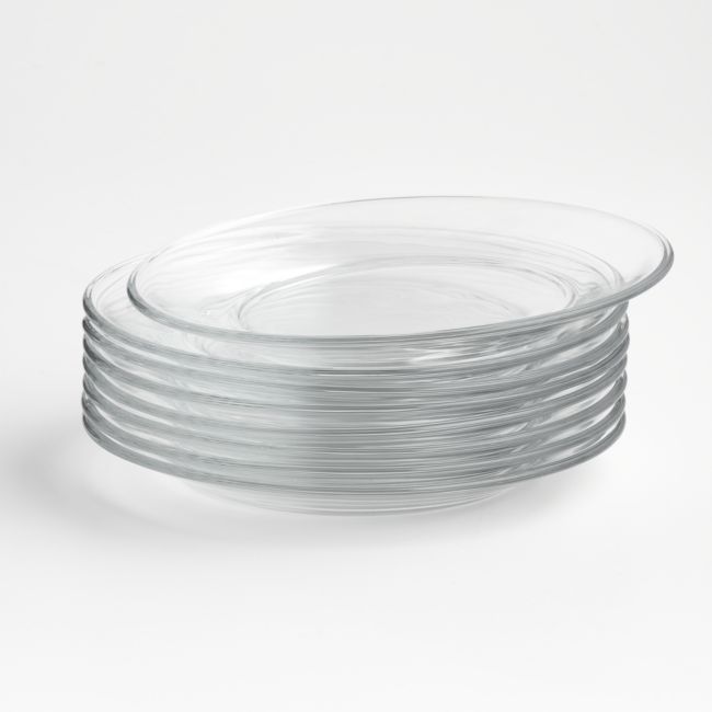 stack of clear glass plates on white background