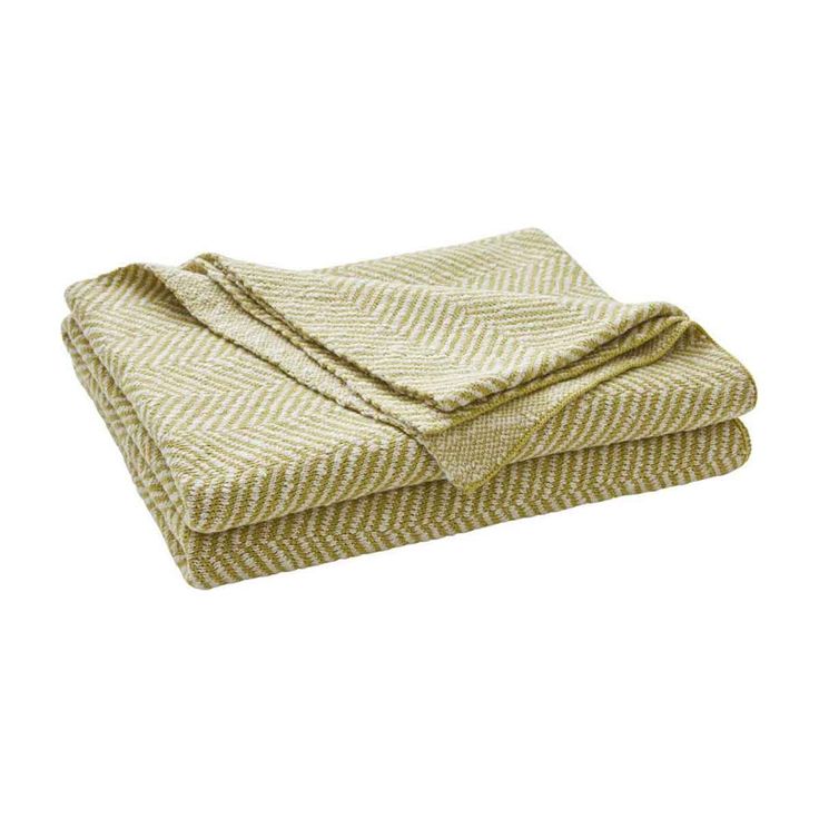 two folded towels sitting on top of each other