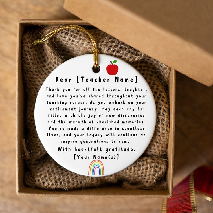 a teacher appreciation ornament in a gift box