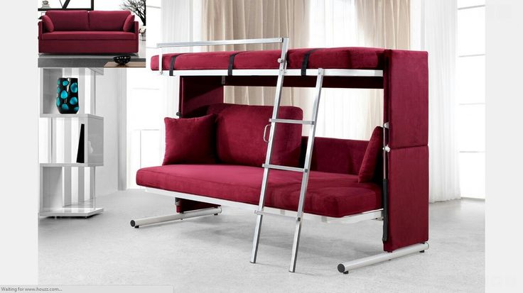 a bunk bed with a red couch underneath it