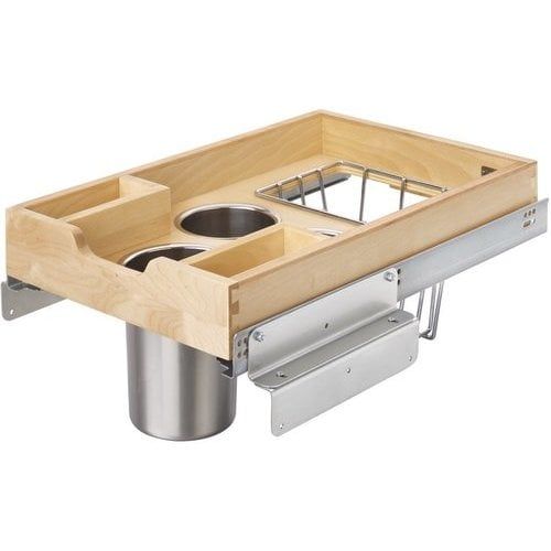 a kitchen drawer with two pots and pans in the bottom compartment, on a white background