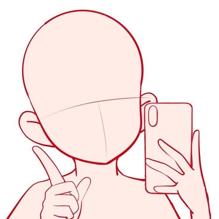 a person holding a cell phone up to their face and pointing at it with both hands