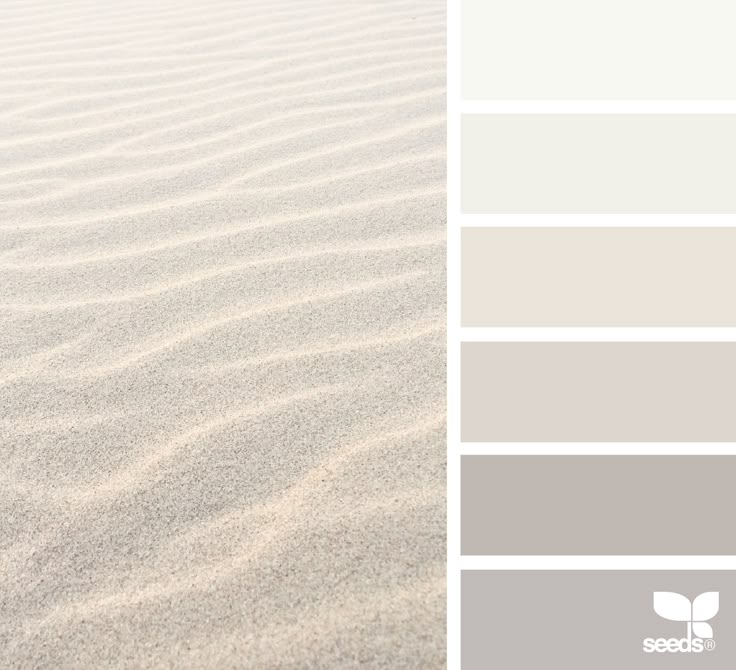 the color palette is gray, white and grey with some light brown tones in it