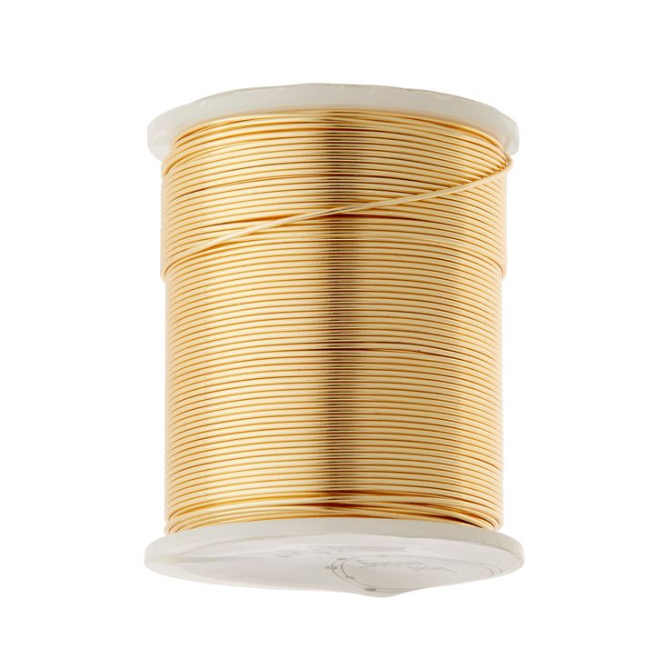 a spool of gold colored wire on a white background