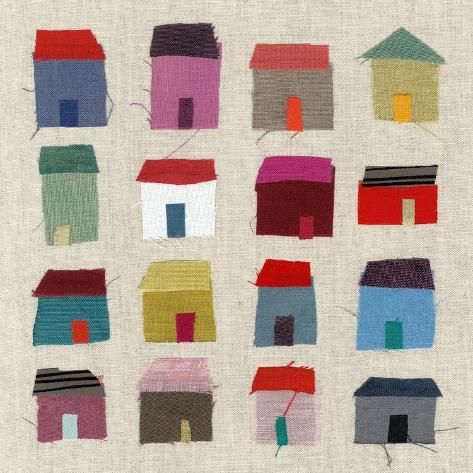 a group of small houses with different colors on them