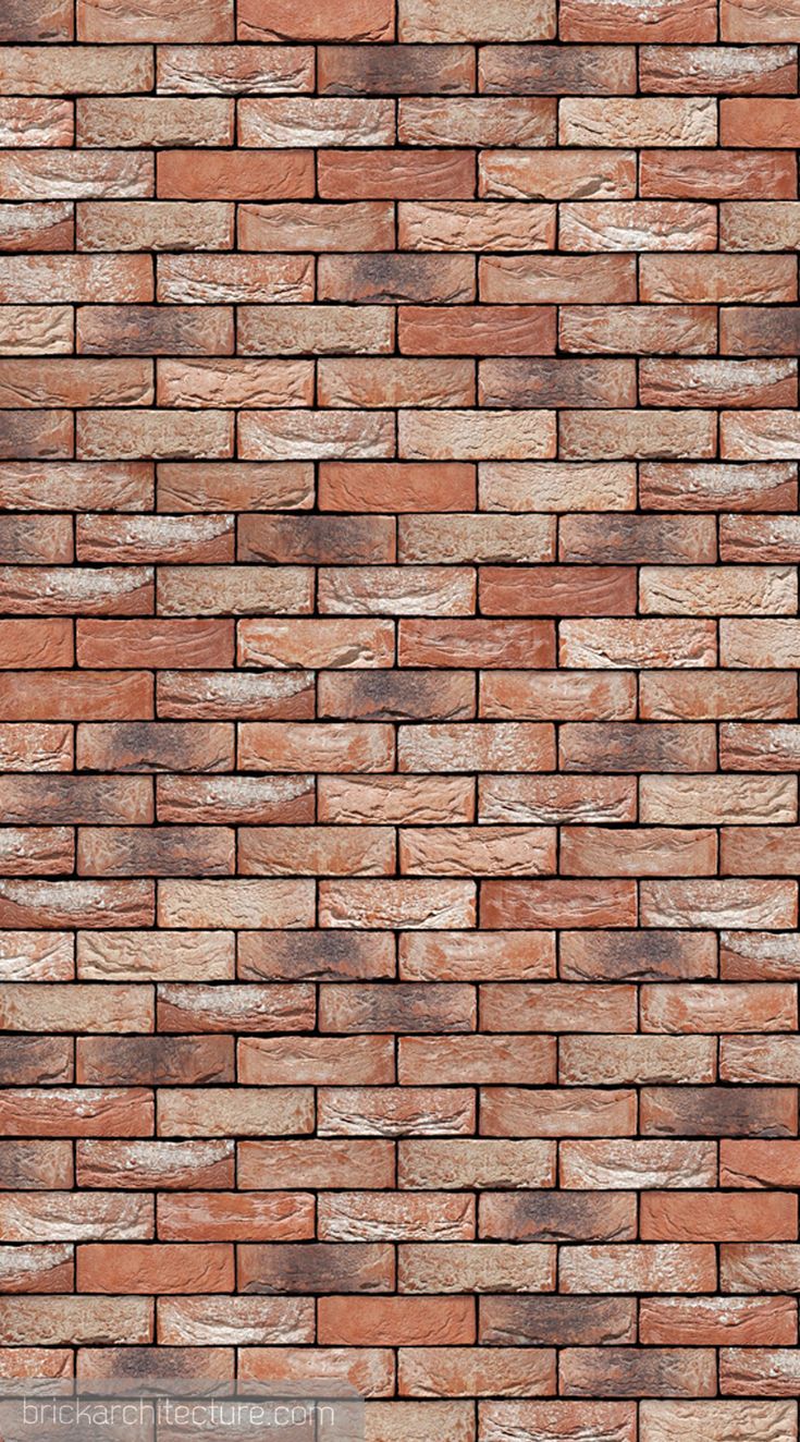 a brick wall that is made out of red bricks