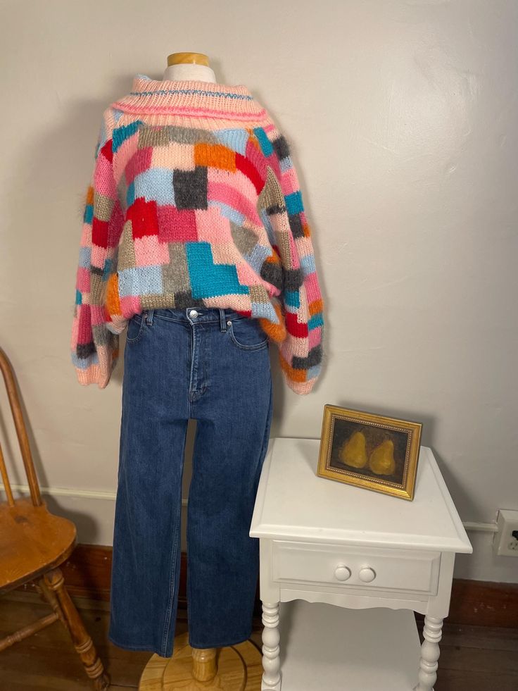 BRAND:  Vintage, hand knit- One of a Kind! This piece came from an amazing collection of clothing, and I'm so excited to share it with you!  SIZING: Similar to a women's size Small/ Medium. The mannequin is a women's size 6-8. Measurements of the piece are in the pictures, but message me with any questions! MATERIALS: There is no tag indicating fibers because it was hand knit.  COLOR(S): Blue, Pink, Purple, Rainbow CONDITION: Vintage, but in amazing condition! Keep in mind this is hand knit, so Sweater Colorful, Patchwork Knit, Multicolor Sweater, Purple Rainbow, Blue Pink Purple, Mohair Sweater, Pullover Sweater Women, Oversized Sweater, Knit Jumper