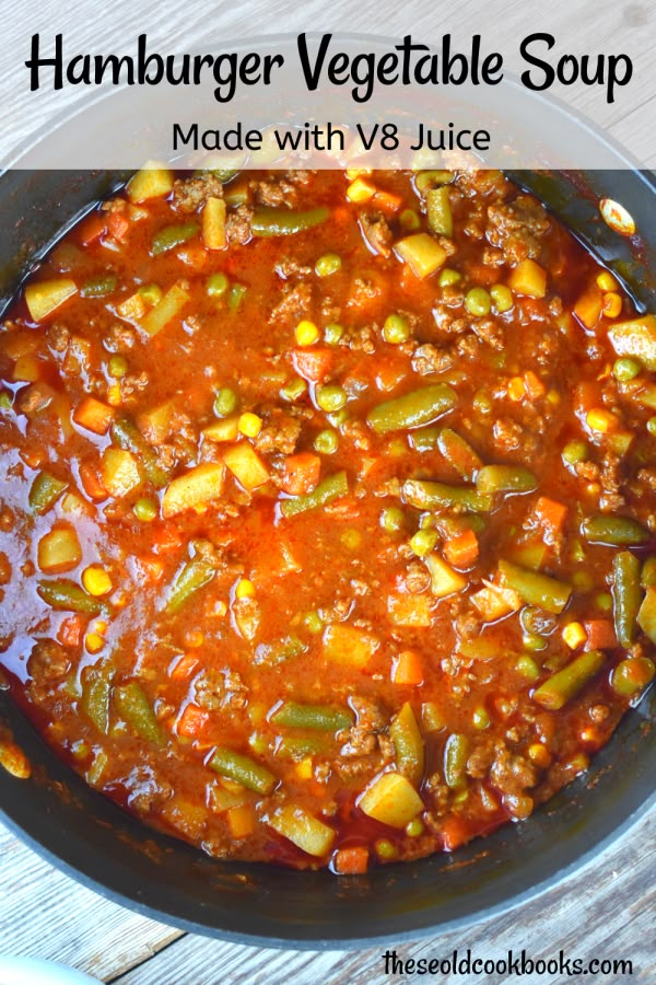 hamburger vegetable soup made with v8 juice in a black bowl on a wooden table