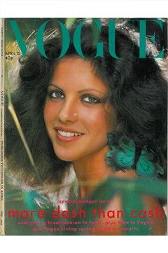 a magazine cover with a woman smiling and butterflies on her hair in the foreground