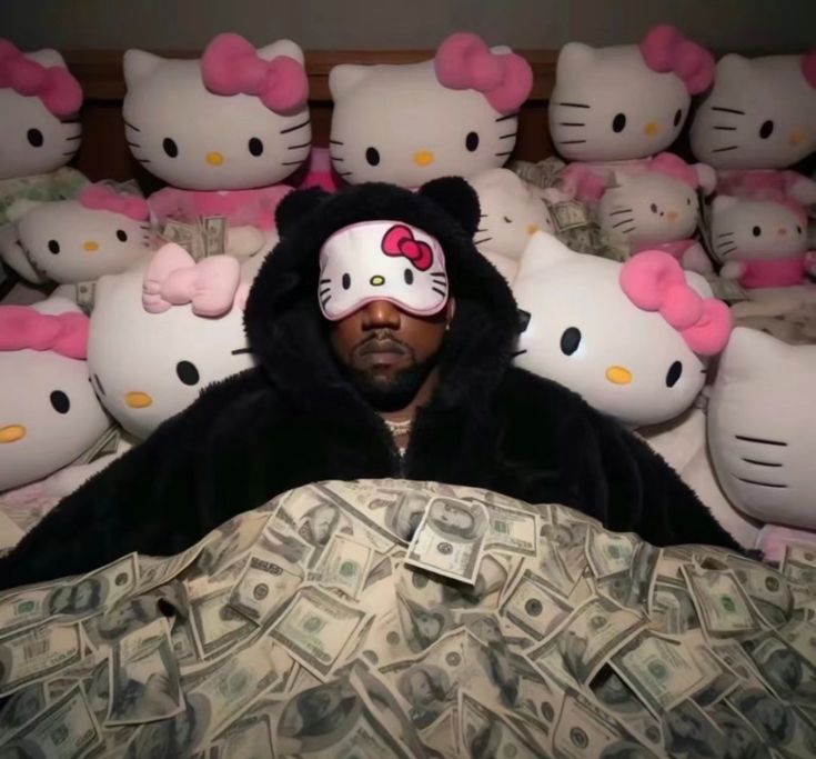 a man in a hello kitty costume surrounded by money